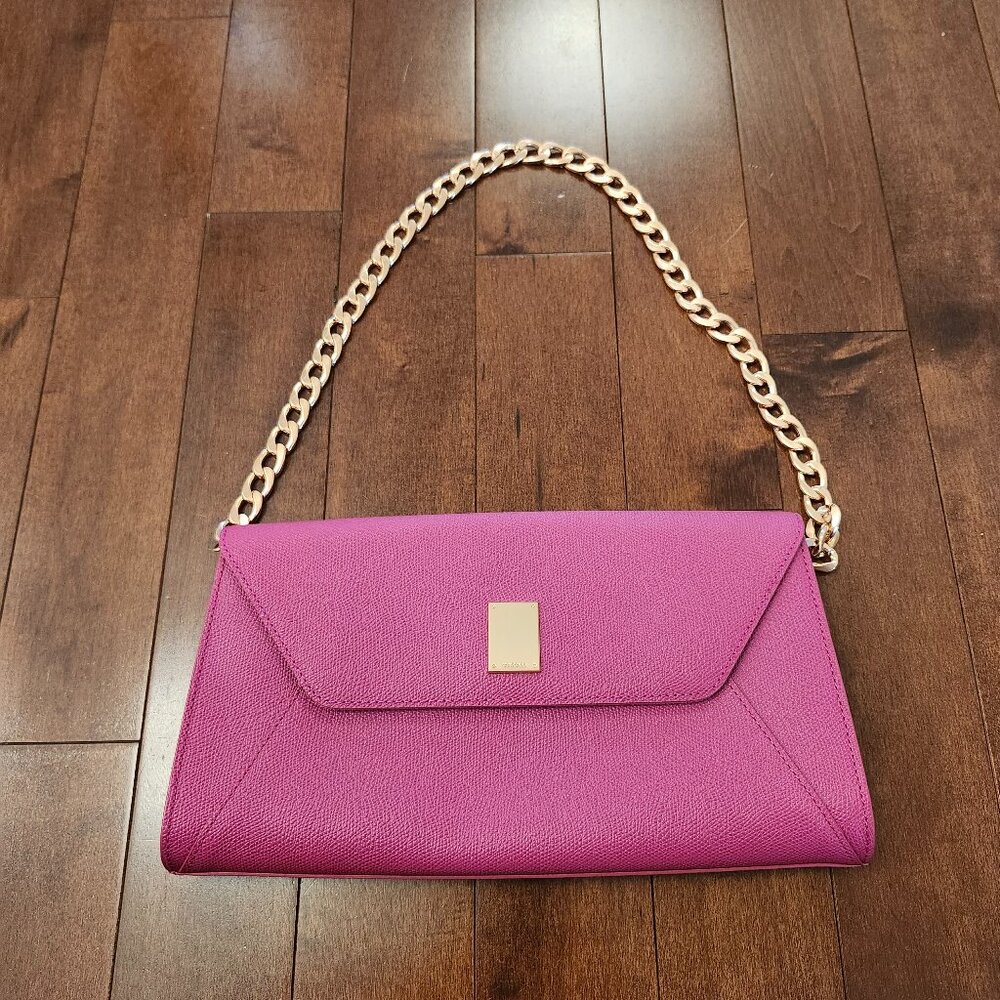 Couronne Kuron hot pink clutch bag
